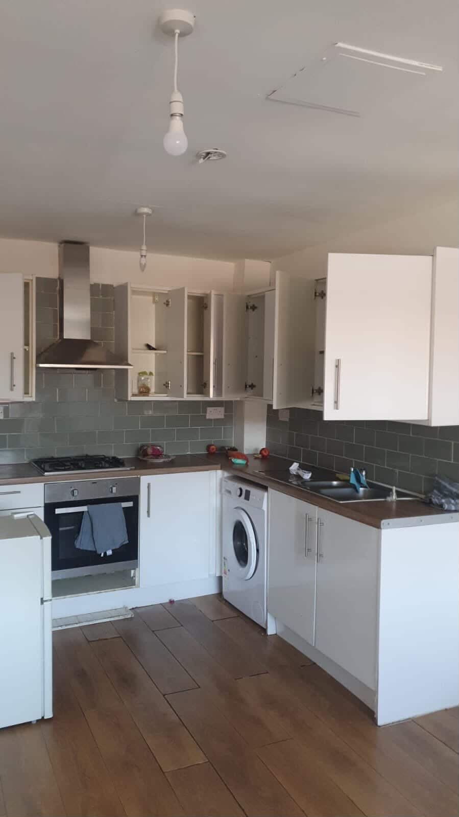 Kitchen before an end of tenancy cleaning reset.